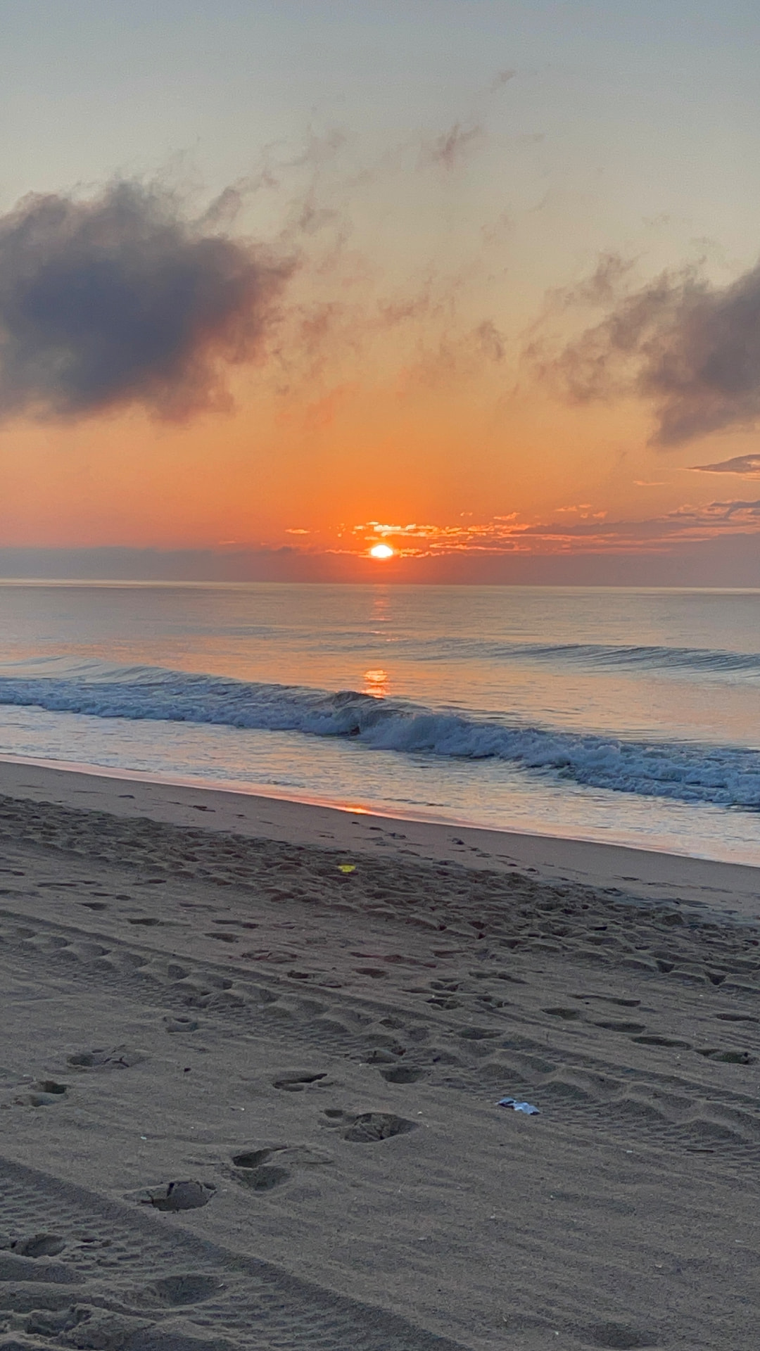 Sunrise burning orange over the Atlantic in Ocean City, Maryland